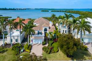 Waterfront Luxury with Expansive Views and Maintenance Free