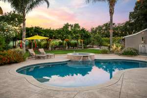 Backyard Oasis and a Home Cute as a Button!