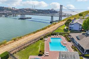 Charming Ground-Floor 2BR/2BA Condo – Steps from Scenic Trails with Stunning Water & Bridge Views!