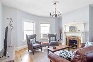 Brookline Village, Fabulous top floor condo. Move right in!