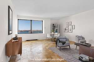 Boston Waterfront 2 bed condo with fabulous water views & huge potential