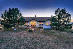 Escape to Tranquility: Spacious 4-Bedroom Ranch with Barn, Stalls, and Unmatched Sunset Views on Fully Fenced 40 Acres!
