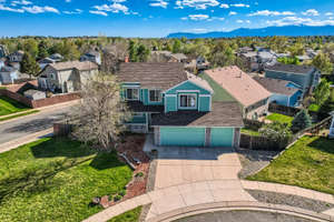 Impressive 2-Story Home on Corner Cul-De-Sac Lot with Walkout Basement and Mountain Views!