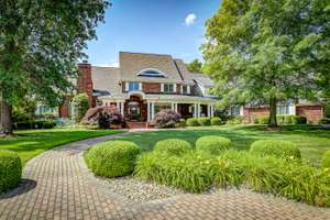 Luxury Living Nestled in a Wooded Backdrop