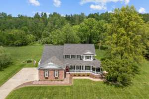 Custom-Built Charm on a Full Acre in Freeburg School District!