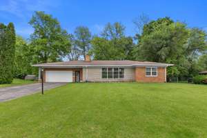 Stylish Renovation with Finished Lower Level on a Half Acre Lot