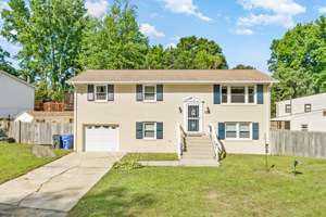 Welcome to 9009 Holly Ave, a beautifully maintained 2,145 sq. ft. split foyer home in serene Country Club South, Waldorf. Featuring a bright living area, modern kitchen, finished basement, vinyl pool,