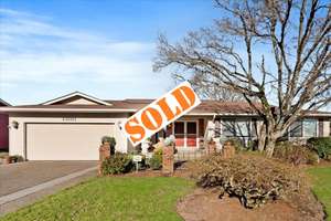 STANDOUT 2-LEVEL RANCH IN PARKROSE! VAULTED WOOD BEAM CEILINGS & QUALITY UPGRADES SET THIS HOME APART!