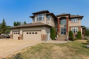 Gorgeous, 2 storey custom home on a golf course in Leduc County