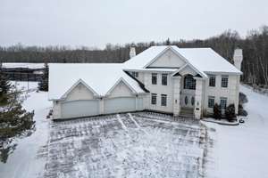 Stunning custom built home on 48 acres in Parkland County