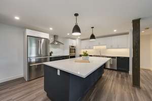 Renovated TOP FLOOR condo in beautiful Belgravia