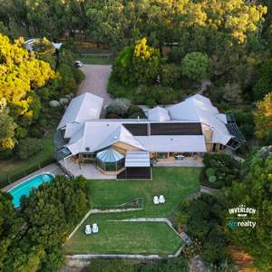 An Expansive Country Estate On 8 Acres Offering Size, Scale, and Location.