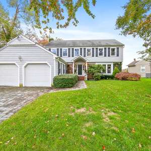 Classic Colonial in one of areas Most Sought After Neighborhoods