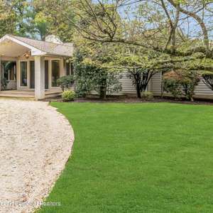 Sprawling Expanded Ranch on 1.6 Acres in One of Rumson's Most Desirable Neighborhoods