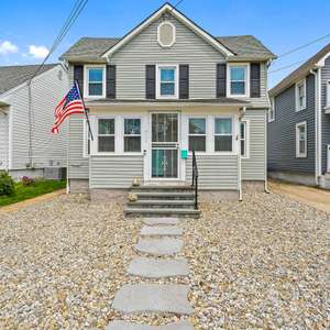 Welcome home to the shore! Live perfectly situated 3.5 blocks from the beach, east of Lake Como.