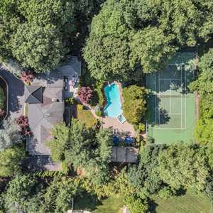 Property, Privacy, Pool AND Tennis Court! Located in one of Rumson's most desirable neighborhoods, this stunning 5 bedroom 4 1/2 bath custom home is set on professionally landscaped 1.5 acres.