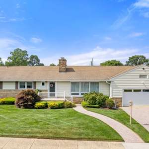 Welcome to this lovely and spacious Custom-Built Ranch in the desirable Gables Section of Neptune Township.