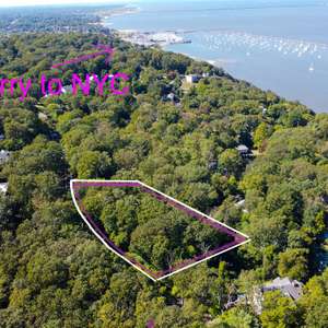 Incredible opportunity to build your dream home nestled in the hills of the Atlantic Highlands with Winter water views. Very private treed lot.