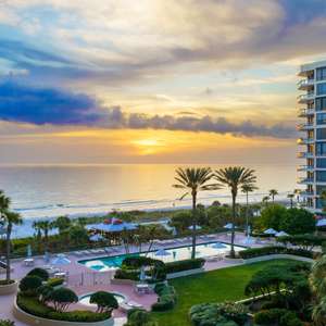 Introducing a truly exceptional beachfront residence that epitomizes the essence of luxury living on Longboat Key.