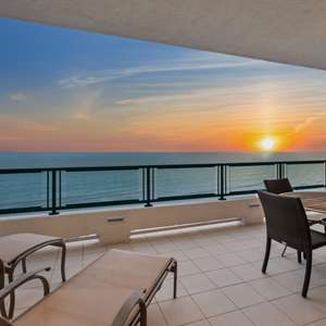 Why choose between breathtaking beach views, serene golf course vistas, or the twinkling city lights when you can have them all?
