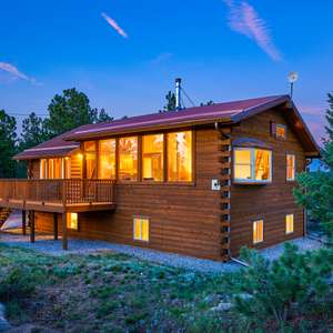Log Home Perched on the Ridge with Sweet Divide Views