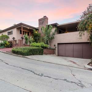 Los Feliz Mid-Century Entertainer’s  Dream Home w/Panoramic City and Mountain Views in the Iconic Franklin Hills Community!