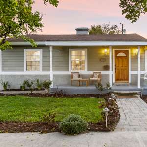 Captivating Mid-Century Farmhouse Bungalow with Contemporary Accents and Serene Backyard Oasis - Walking Distance to Magnolia Park!