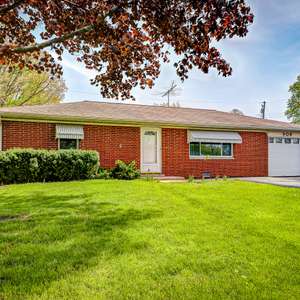 Adorable Brick Ranch with a Fenced Rear Yard