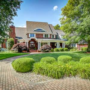 Luxury Living Nestled in a Wooded Backdrop