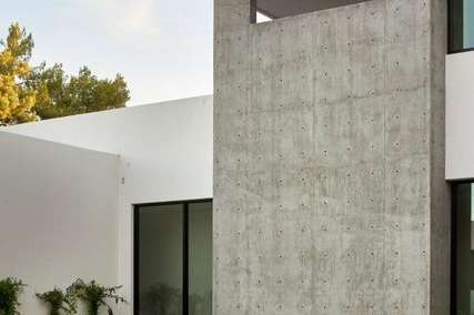 8 of 27. This modern corner view showcases flawless construction and dramatic contrast an artistic exterior moment that reflects the home s refined architectural aesthetic.