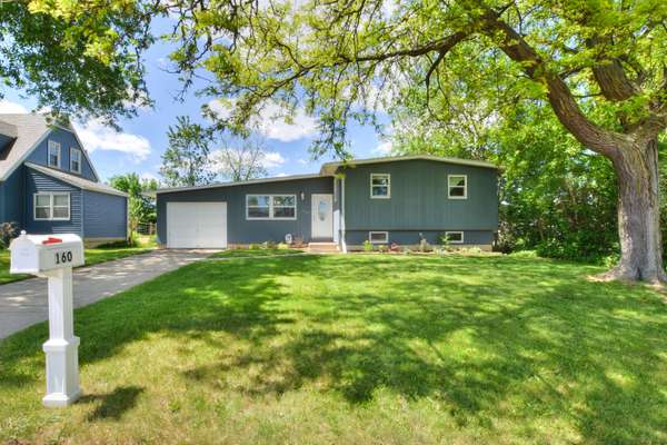 Updated Tri-Level Contemporary near Sun Prairie Schools and revitalized downtown!