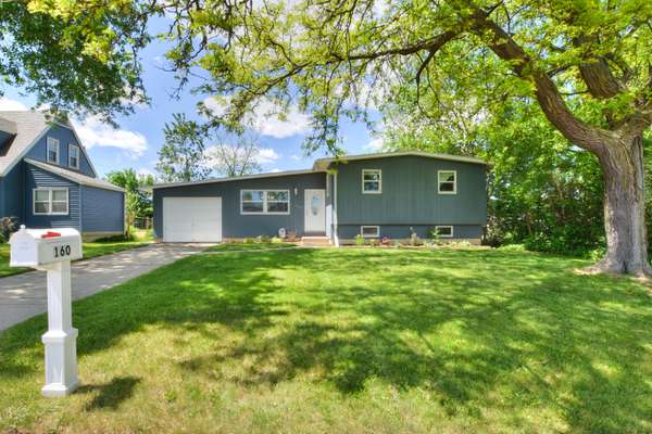 Updated Tri-Level Contemporary near Sun Prairie Schools and revitalized downtown!