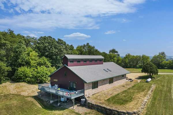 Unique custom home on 4+ acres just 30 minutes from Madison's west side!