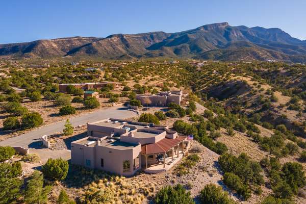 Views for MILES! Sandia Mountain, Western Mesa, Cabezon Peak, Jemez Mountains!