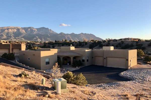 Single level - no steps! - with amazing Sandia Mountain views!