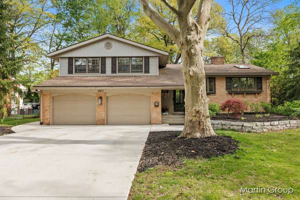 Discover Your Dream Home: Timeless Mid-Century Charm in East Grand Rapids!