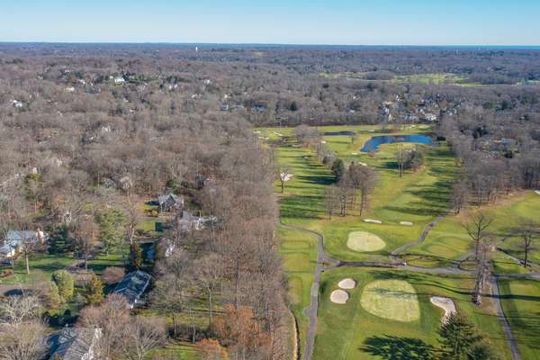 UPDATED SPRAWLING RANCH IN COVETED NEIGHBORHOOD WITH GOLF COURSE VIEWS