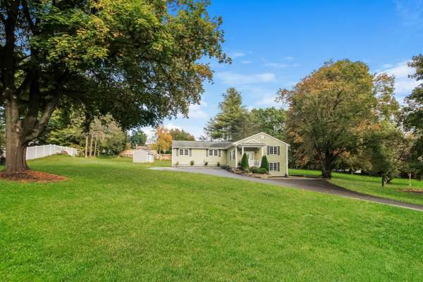 EXPANDED & UPDATED 5-BEDROOM, 3 FULL BATHROOM RANCH W/ FULL IN-LAW APARTMENT!
