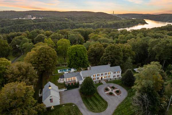 THE RICHTER ESTATE - GRAND ARCHITECTURAL MASTERPIECE WITH DIRECT WATERFRONT ON CONNECTICUT RIVER