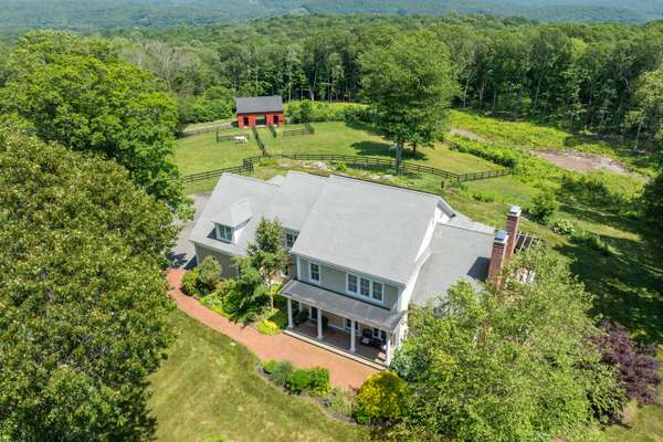 LUXE MODERN FARMHOUSE WITH 4-STALL BARN ON OVER 10 ACRES