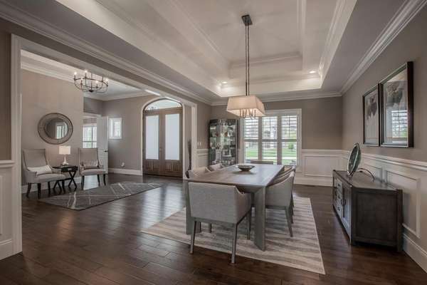 Formal Dining Room with Double Tray Ceiling, Chair Rail and Wainscoting