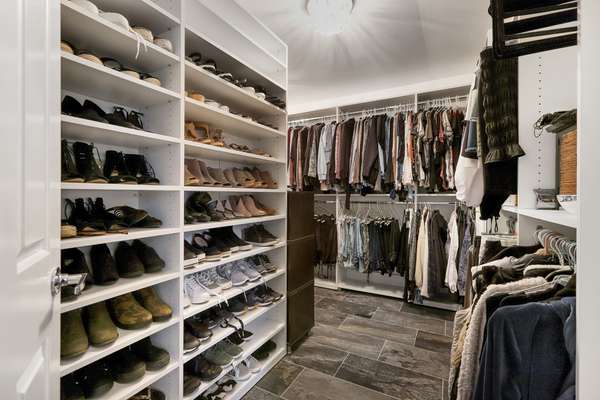 Fabulous, custom organized walk-in closet.