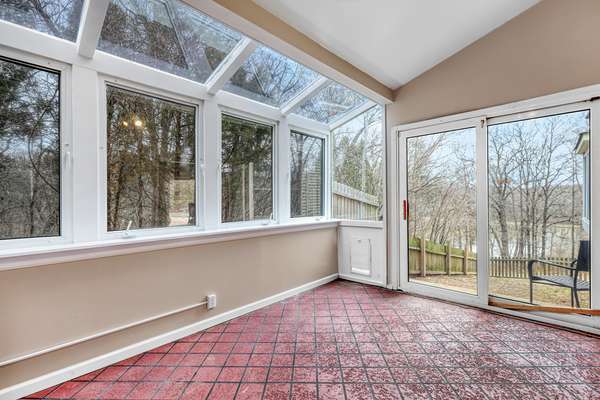 Tour the lower level to find a spectacular 4 seasons room, currently used as a home office.
