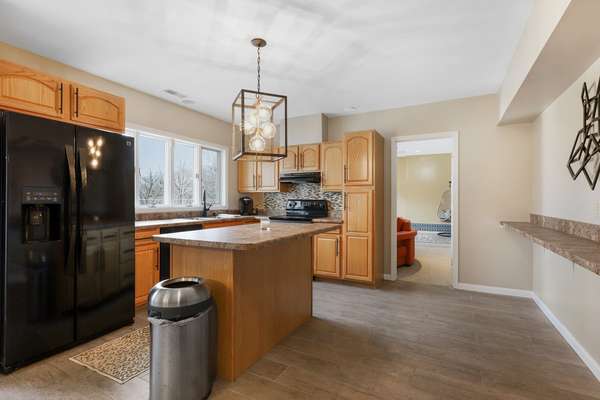 Enjoy spectacular entertaining options with a full 2nd kitchen in lower level.