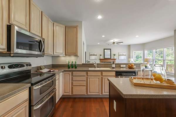 42 Custom Cabinetry, and Solid Surface Countertops