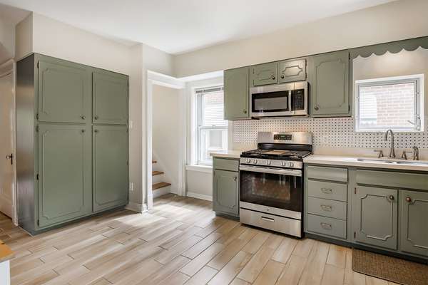 Stainless steel appliances, Ceramic Tile Floors, and Pantry