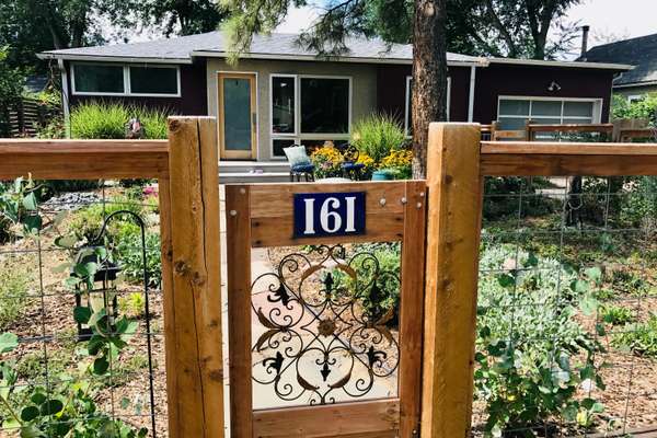 Welcome to this rare and stunning modern luxury home and detached studio located in the heart of Old Town Niwot!