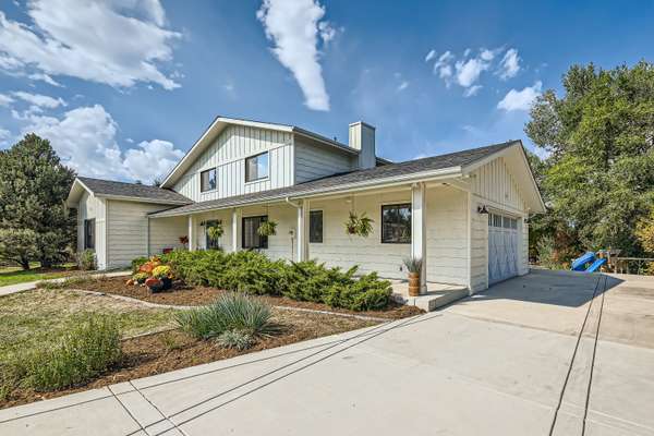 Charming farmhouse on 0.66-acre lot in Niwot, with updated features, no HOA, and close to trails, shops, and restaurants.