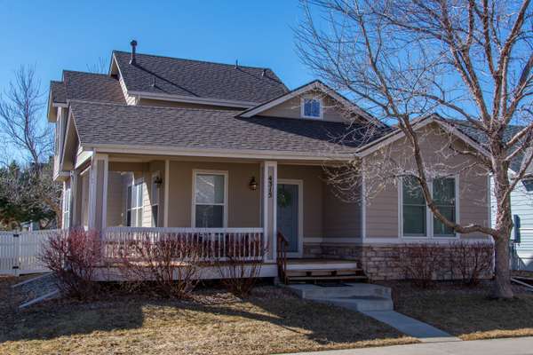 Charming Home with Coveted Main Floor Primary Suite – Comfort & Convenience Await!