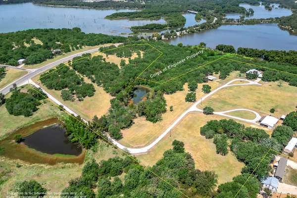 Custom Home, Pond, and Stable on 20 Prime Acres